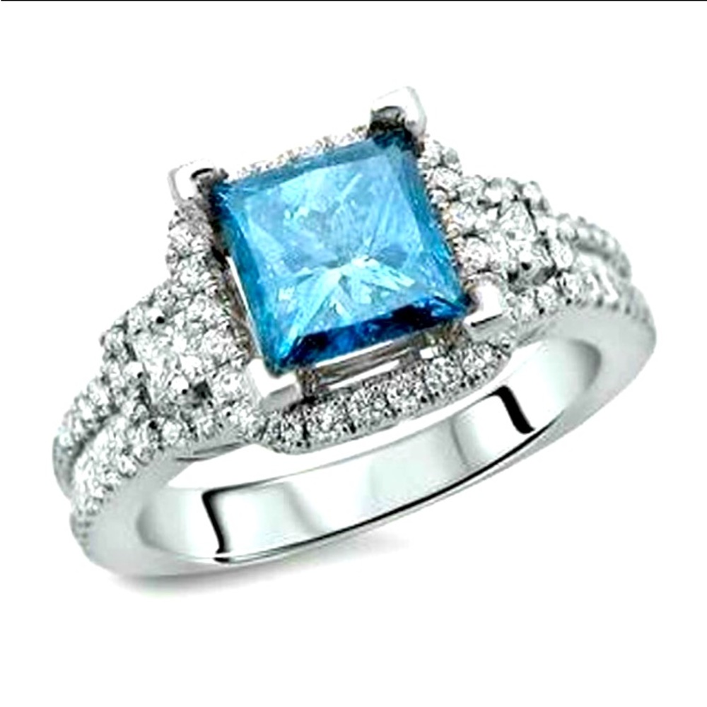 Beautiful 18k w/g Blue & White Diamond Ring. ERV $9,895.